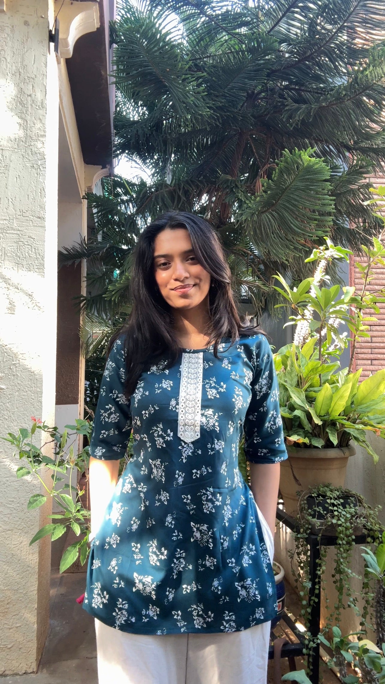 Raha (Teal blue embroidered top)