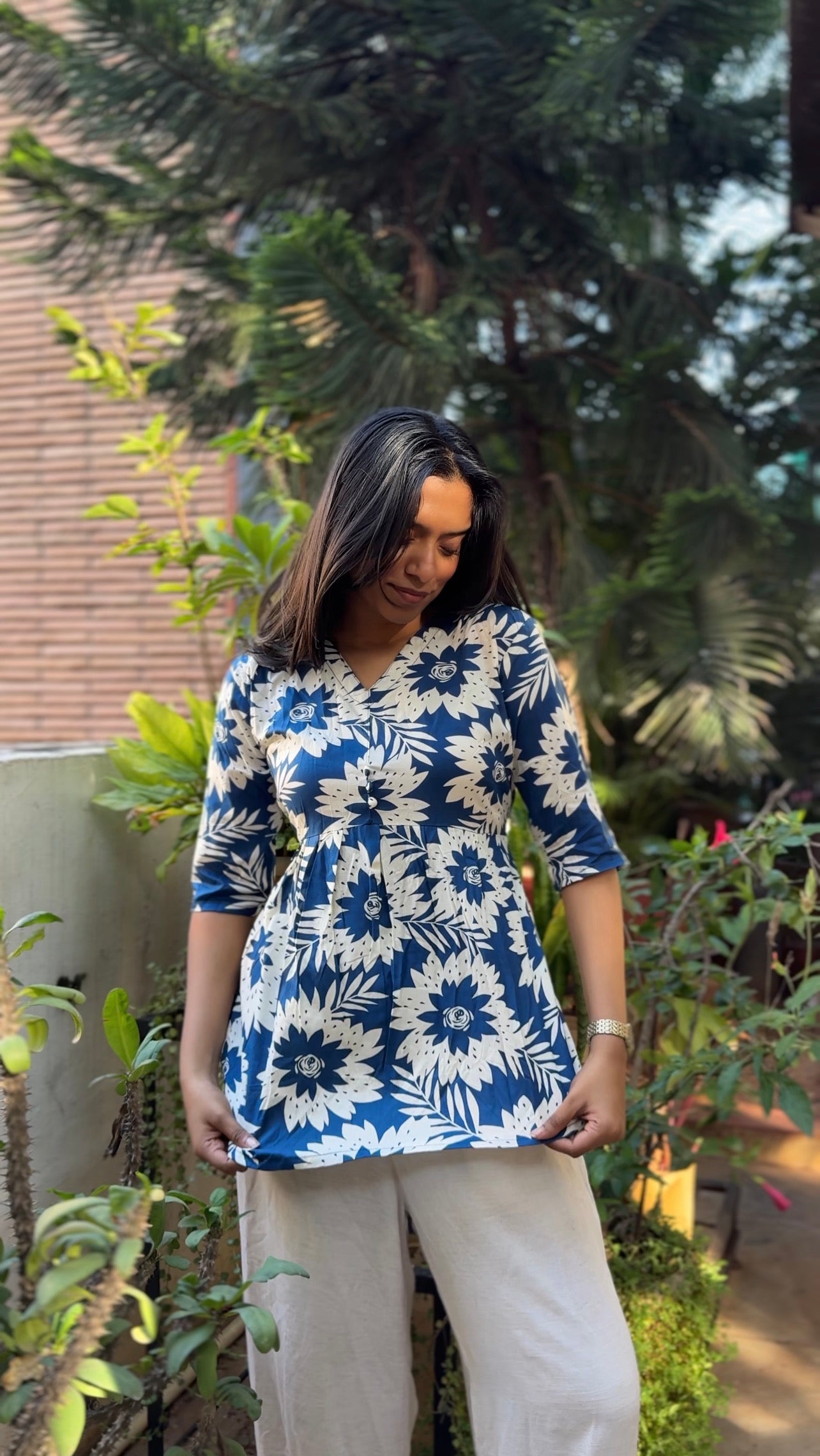 Leher  (Navy blue breezy floral top)