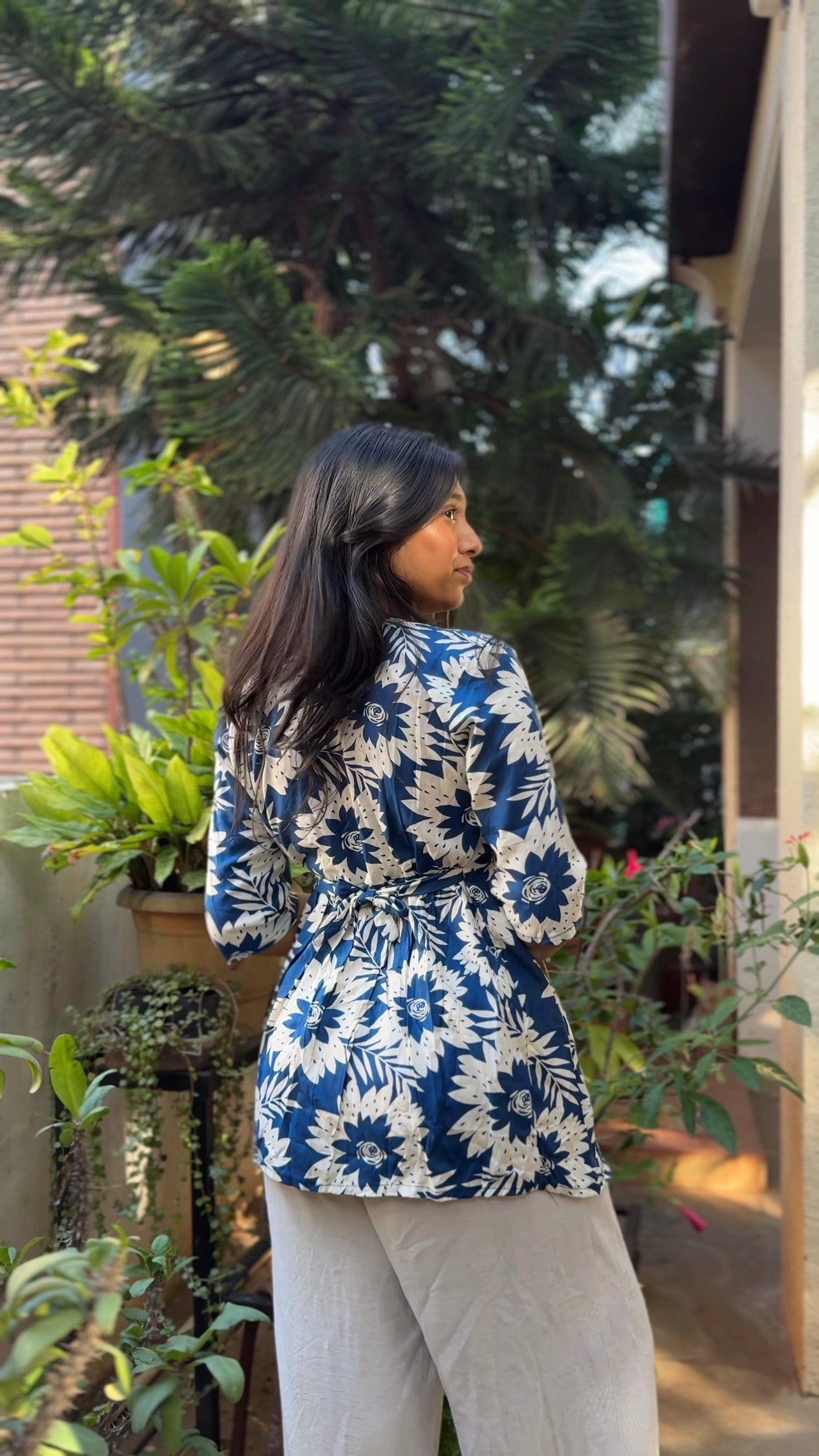 Leher  (Navy blue breezy floral top)