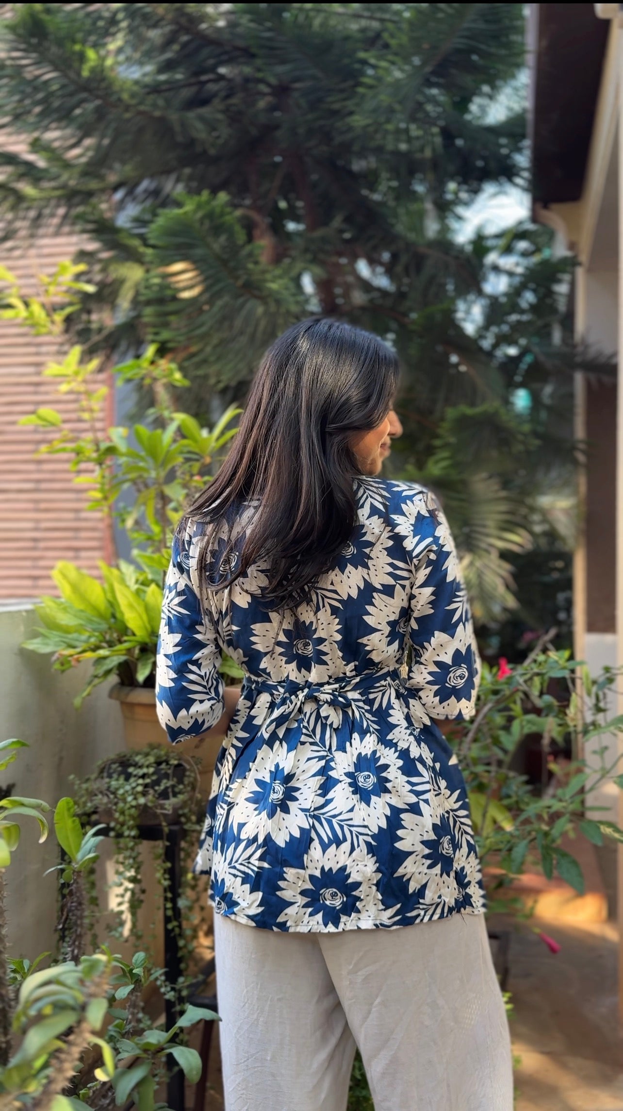 Leher  (Navy blue breezy floral top)